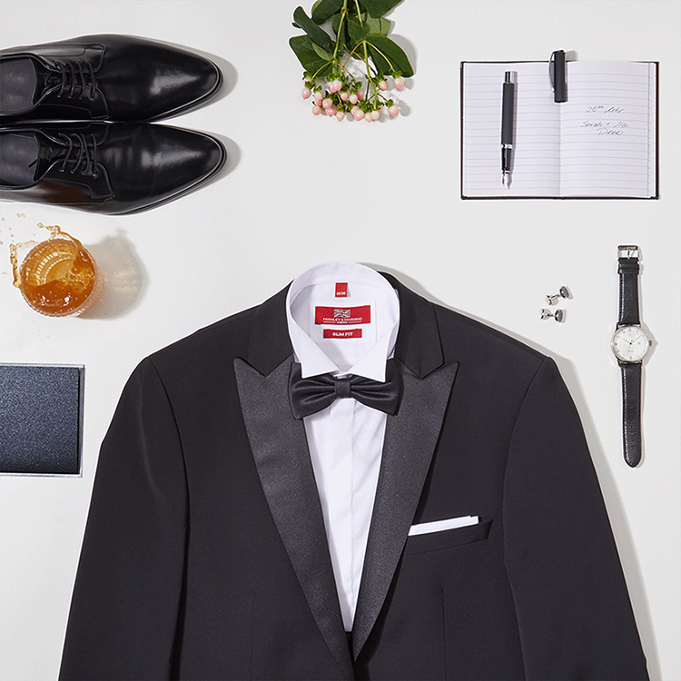 Herrenmode Schwarzer Anzug mit Schuhen und Armbanduhr Hochzeitsoutfit